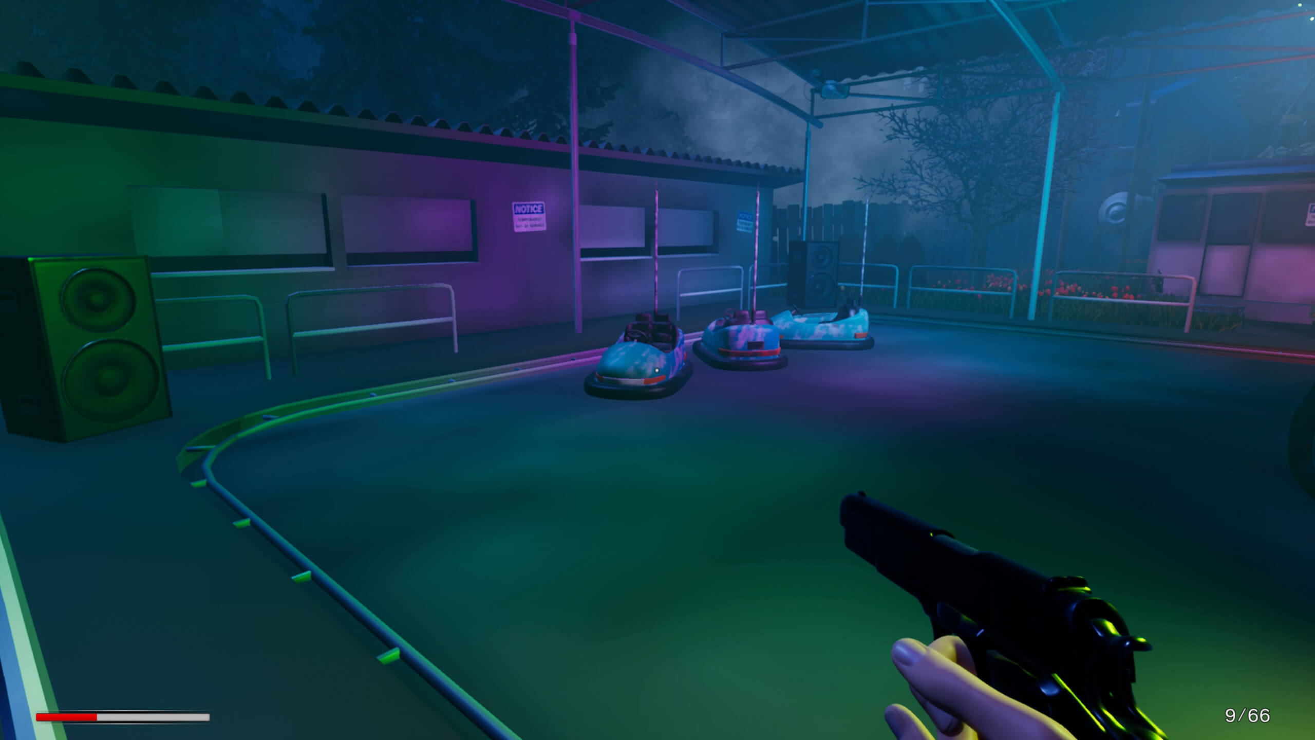 A screenshot of a bumper cars area at the fair. I am holding my pistol while looking at the environment. 