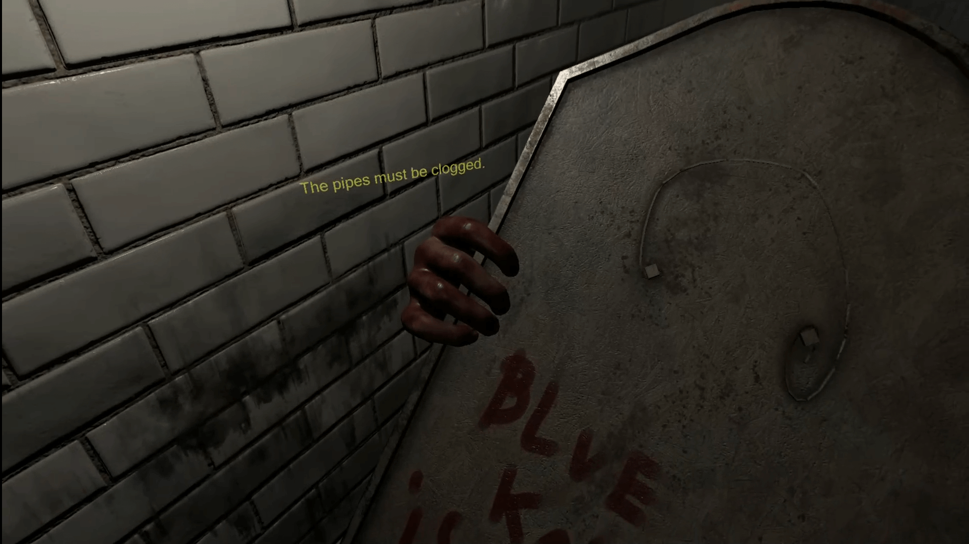 screenshot from Madison VR. white dirty tiles run across the wall. a bloody hand holds a mirror showing its back with the words Blue Knees is real written in blood. the subtitles "the pipes must be clogged" float in the middle of the screen