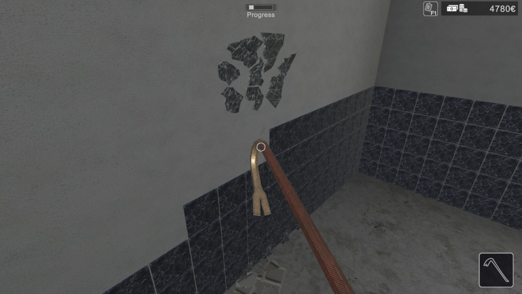 A picture of showing a crowbar hitting a tiled wall removing the tiles